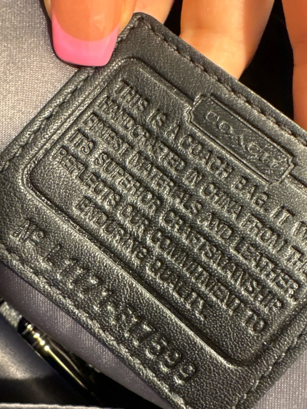 Coach Black Leather Tote with Gold Tag Accent